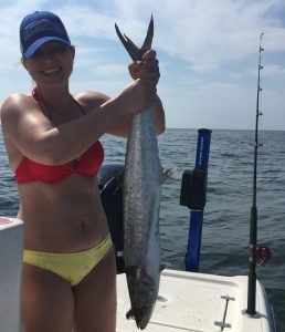 lady holding king mackerel