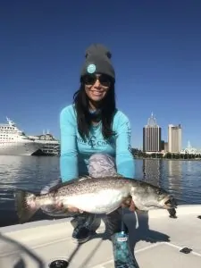 sara maria holding large speckled trout
