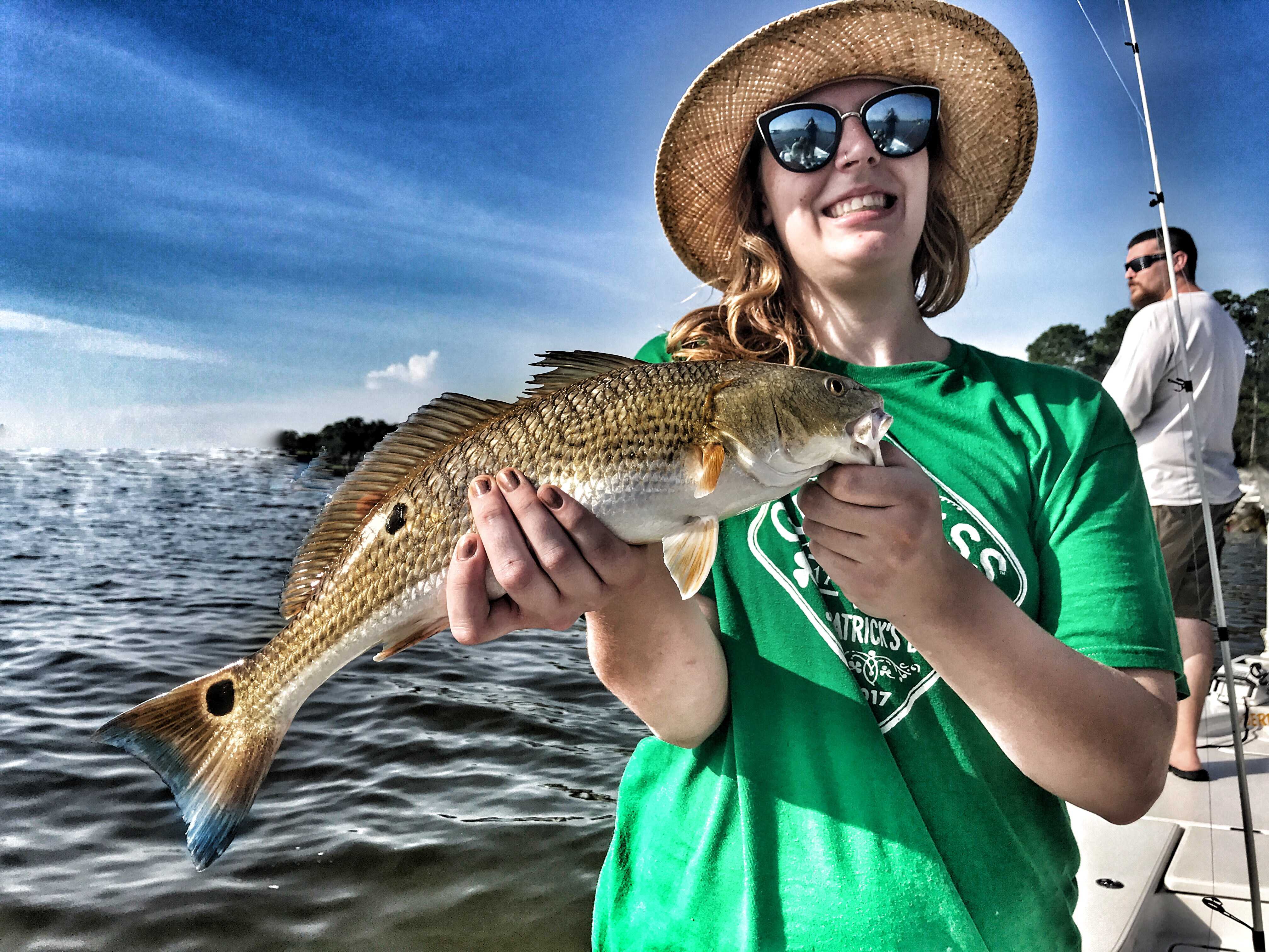 woman-holding-multi-spot-redfish
